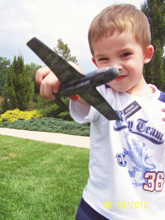 Liam and his airplane Image